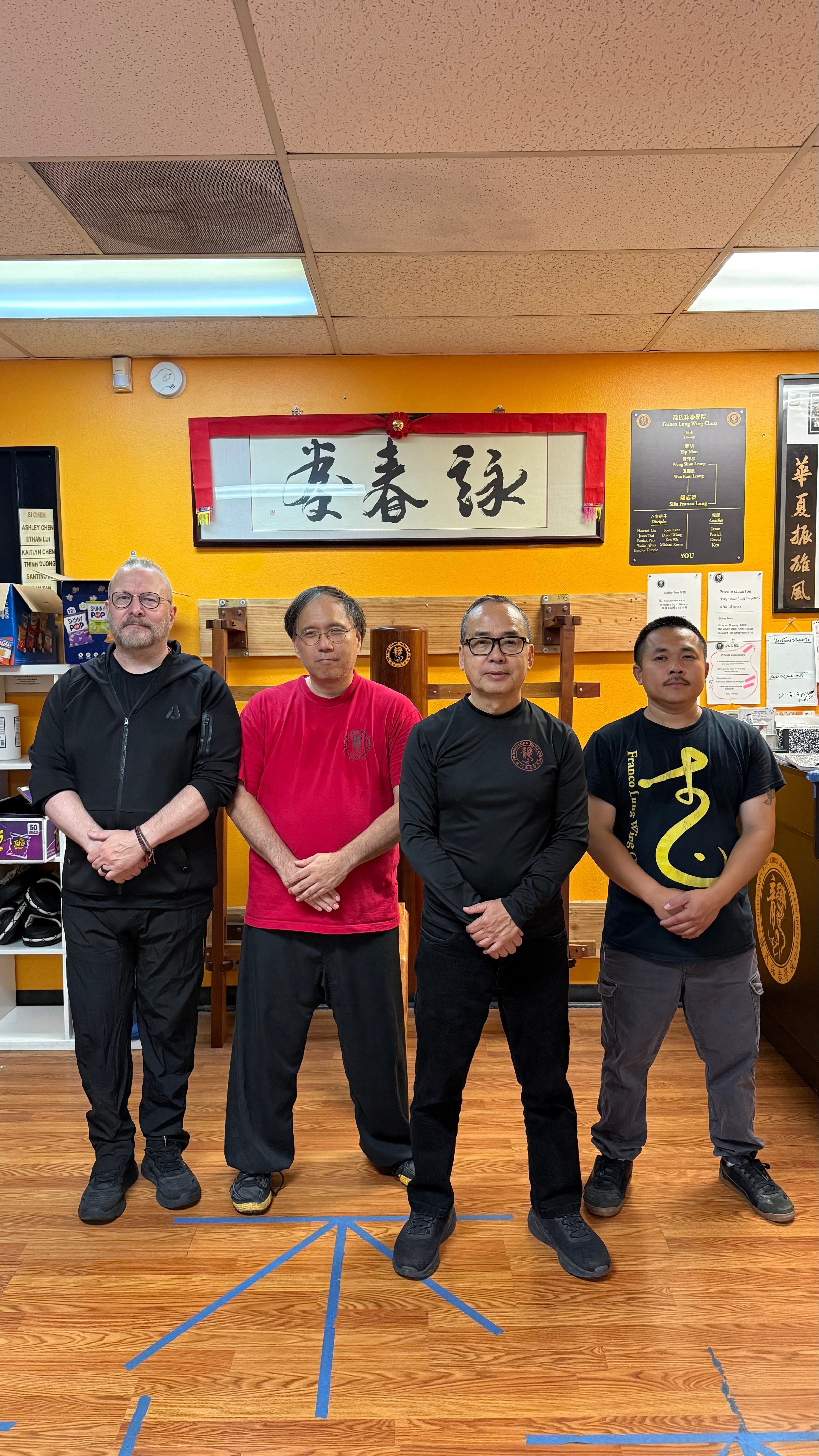 Coach Patrick, Coach Jason, GM Lung, and Coach Ken at the school
