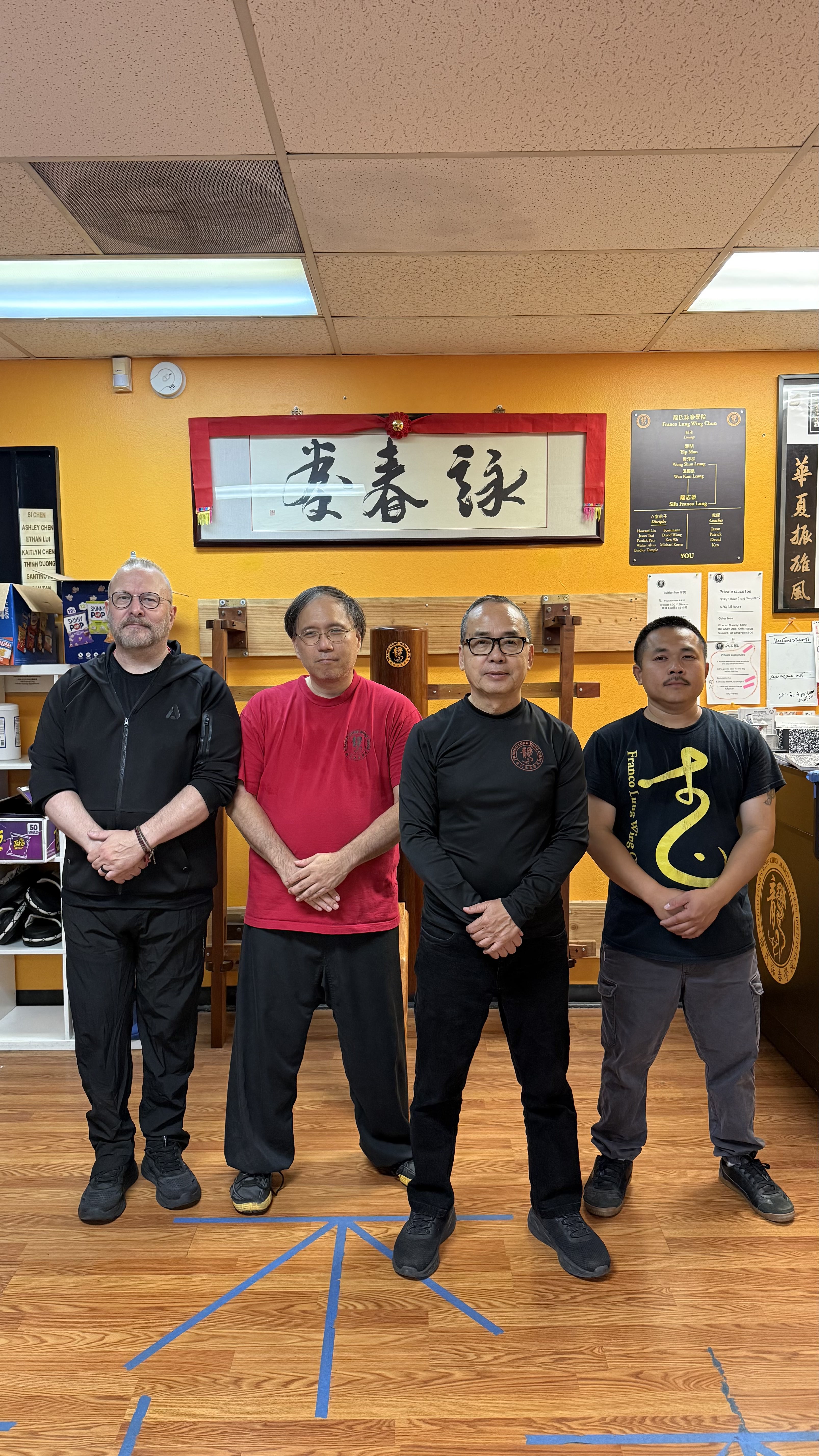 Coach Patrick, Coach Jason, GM Lung, and Coach Ken at the school